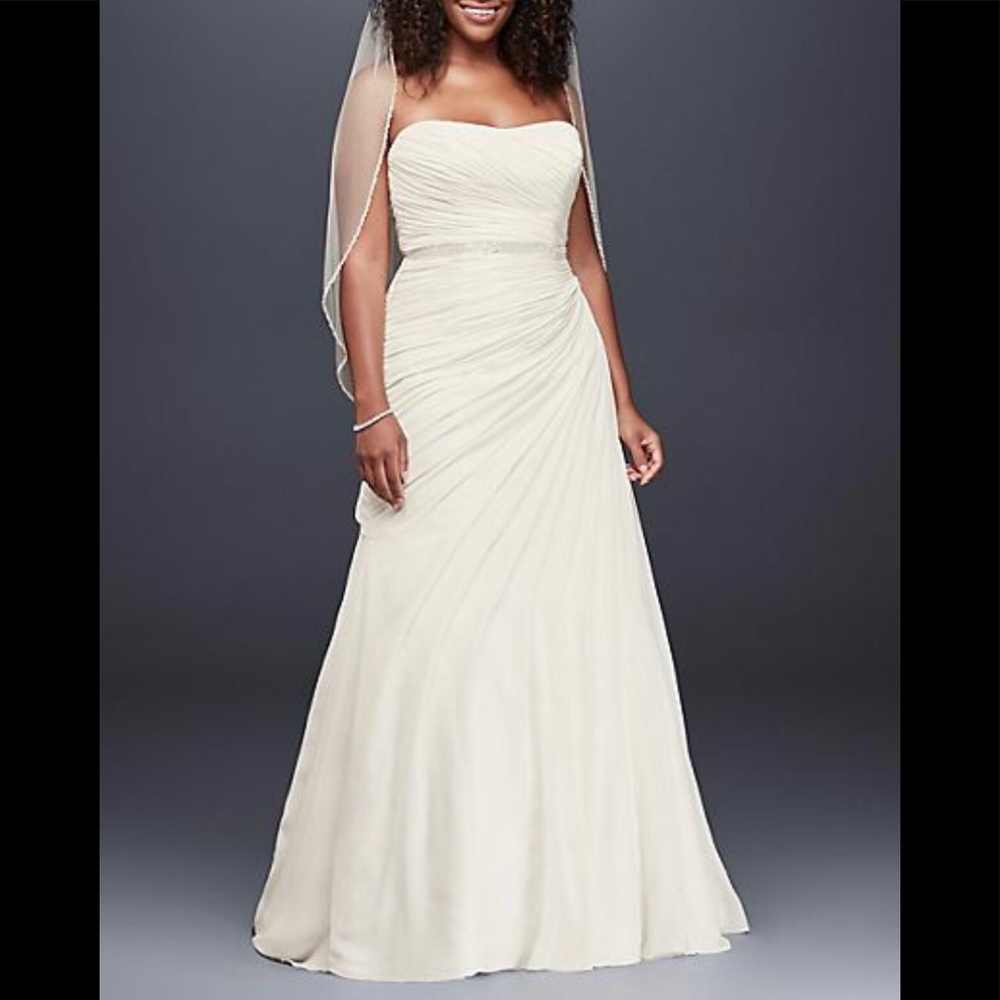 Cream colored Chiffon draped wedding dress with boustiet and puffy underskirt
